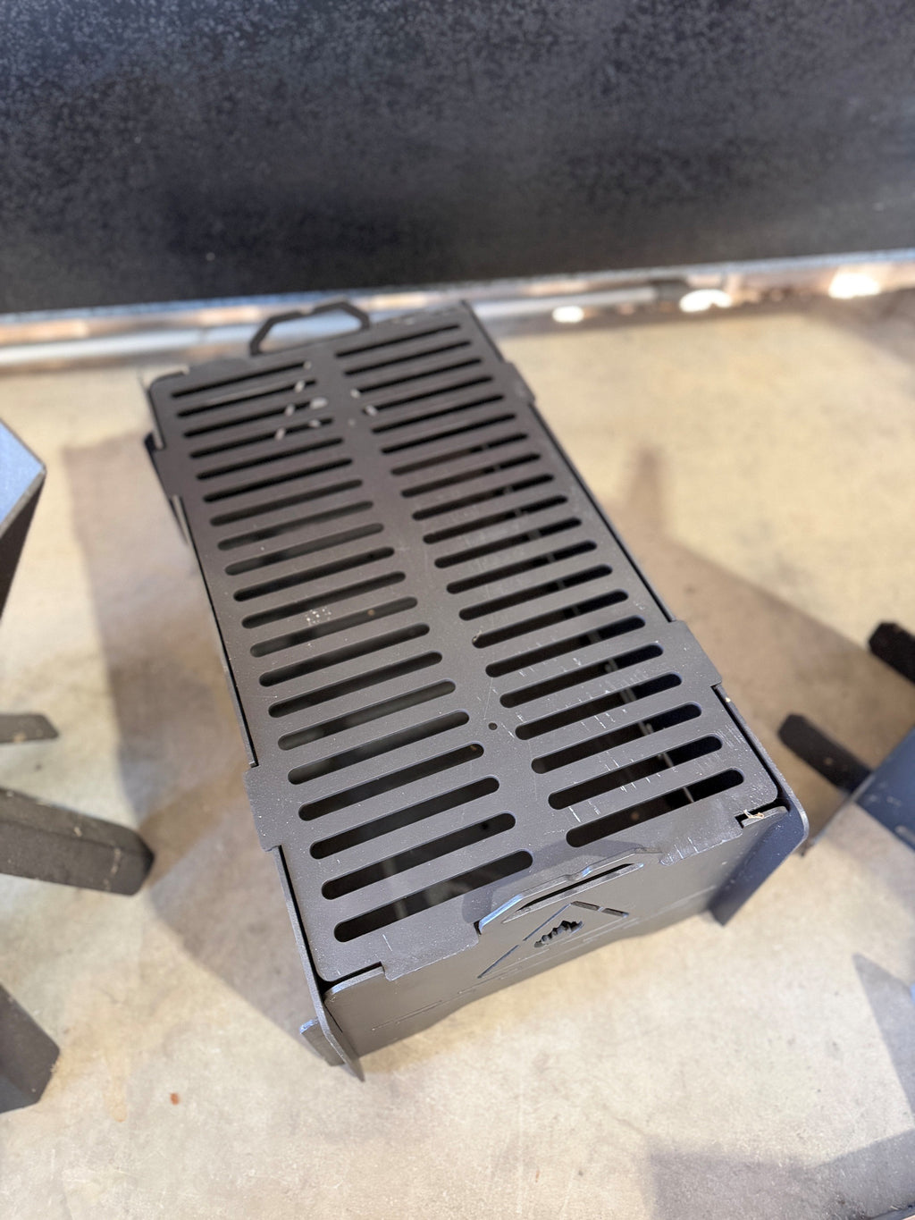 laser cut flat pack fire pit and grill 3mm steel rectangular carry handles full length grate Mackay Australia